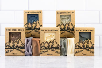 Five bars of soap with stamps, bison, bear, moose, elk and wolf