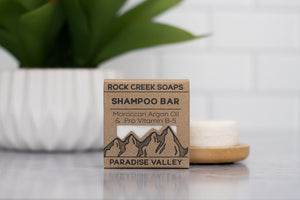 Shampoo Bar on display with plant in background